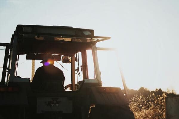 Adaption Strategies for farmers - Combine at Sunset